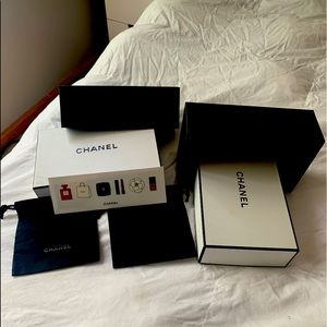 2 Chanel boxes and dust bags
